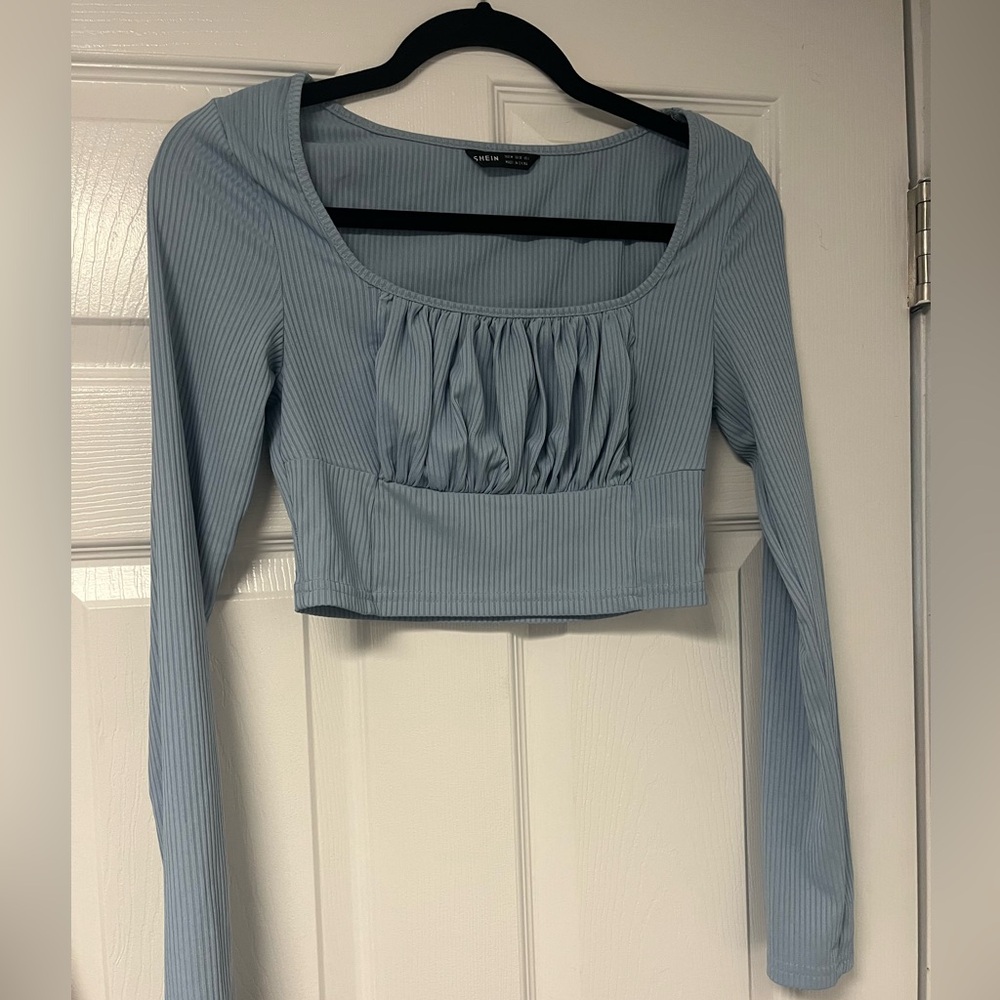 Light blue top